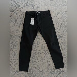 Men Faux Leather Pants in Black size 34